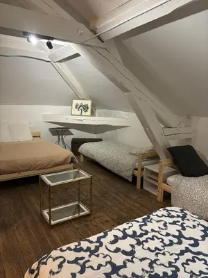 Un ou plusieurs lits dans un hébergement de l'établissement Villa Belle Époque - 18 couchages FEURS 42