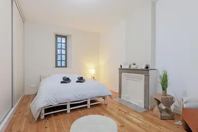 Un ou plusieurs lits dans un hébergement de l'établissement La Maison du Gardien