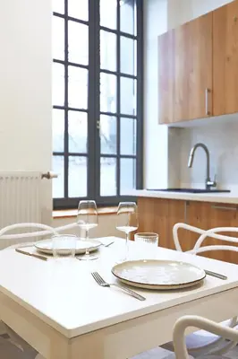 Cuisine ou kitchenette dans l'établissement La Maison du Gardien