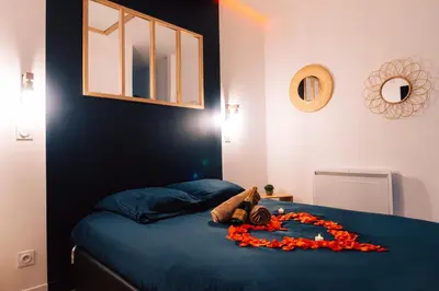 Un ou plusieurs lits dans un hébergement de l'établissement Evasion romantique & spa