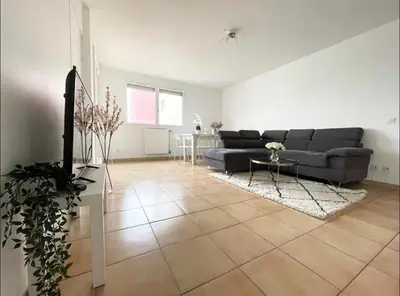 Coin salon dans l'établissement Apartment - Le Melies