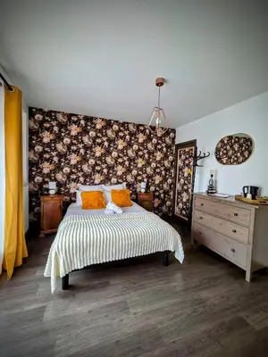 Un ou plusieurs lits dans un hébergement de l'établissement Le Clos des Roses - Chambre d'hôtes