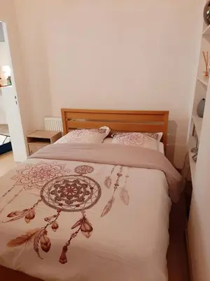 Un ou plusieurs lits dans un hébergement de l'établissement Lyon Centre Warm apartment full of charm