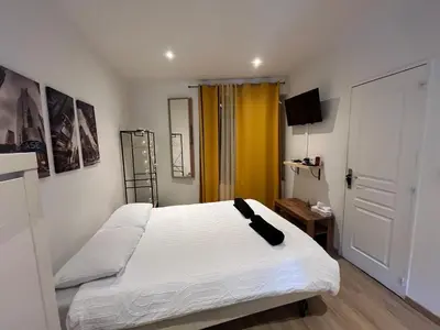 Un ou plusieurs lits dans un hébergement de l'établissement T2 Modern and Cosy in St Étienne