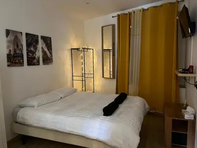 Un ou plusieurs lits dans un hébergement de l'établissement T2 Modern and Cosy in St Étienne