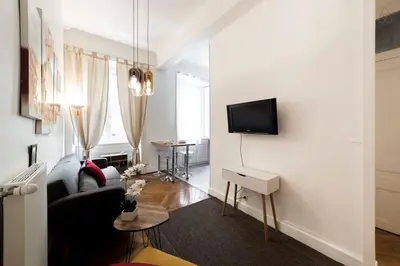 Télévision ou salle de divertissement dans l'établissement Perfect to visit Lyon with family or friends AIL