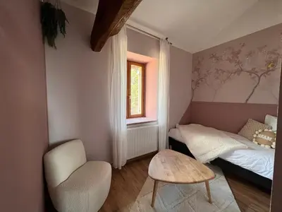 Un ou plusieurs lits dans un hébergement de l'établissement Domaine des Vignes d'Hôtes