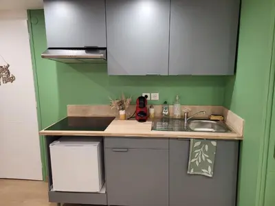 Cuisine ou kitchenette dans l'établissement Mon Nid'éal de Bien-être