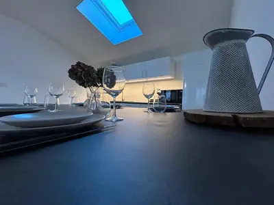 Cuisine ou kitchenette dans l'établissement Le cosy clem