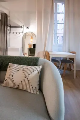 Coin salon dans l'établissement Le St Jean - 26m2 Vieux Lyon