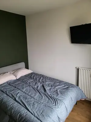 Un ou plusieurs lits dans un hébergement de l'établissement Chambre privée dans un appartement en colocation proche groupama stadium, ldlc arena,aéroport,euroxpo