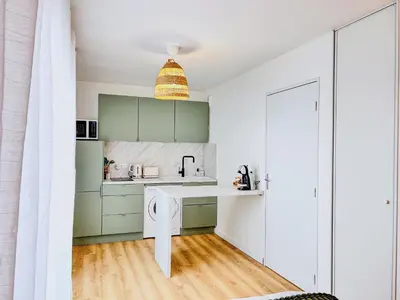 Cuisine ou kitchenette dans l'établissement Studio Cosy idéalement situé