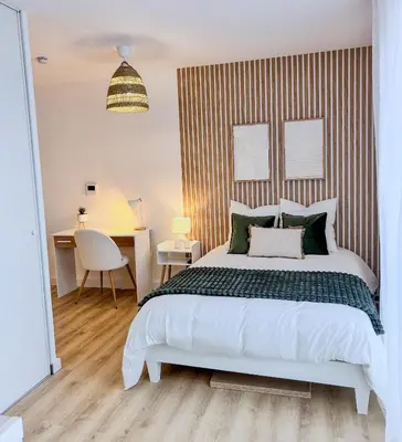Un ou plusieurs lits dans un hébergement de l'établissement Studio Cosy idéalement situé