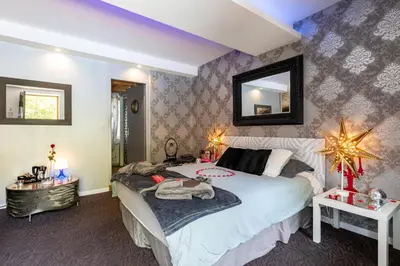 Un ou plusieurs lits dans un hébergement de l'établissement Maison Lili Paradis