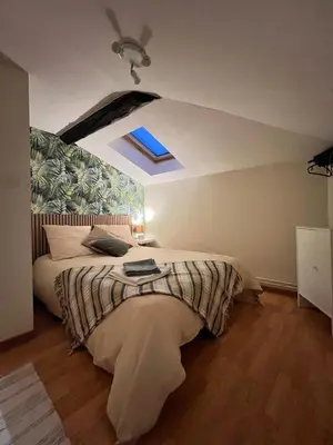 Un ou plusieurs lits dans un hébergement de l'établissement L 'Écrin de Trévoux 3 Chambres confort