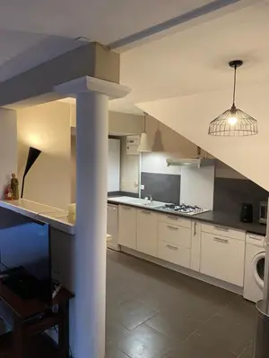 Cuisine ou kitchenette dans l'établissement La rencontre