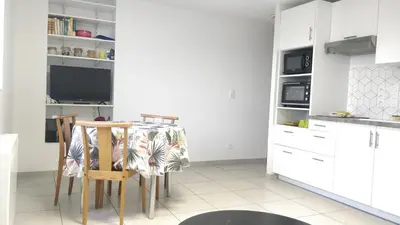 Cuisine ou kitchenette dans l'établissement Superbe appartement à Seyssuel