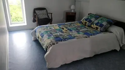 Un ou plusieurs lits dans un hébergement de l'établissement Superbe appartement à Seyssuel