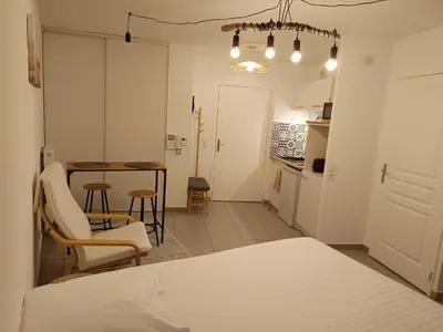 Un ou plusieurs lits dans un hébergement de l'établissement Studio Villa'vi