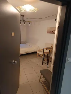 Un ou plusieurs lits dans un hébergement de l'établissement Studio Villa'vi