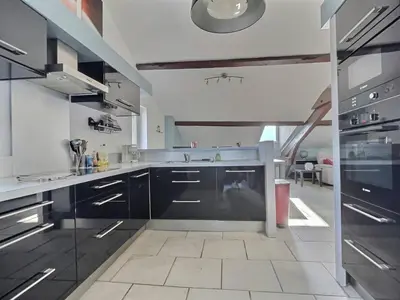 Cuisine ou kitchenette dans l'établissement Appartement 3 chambres proche gare
