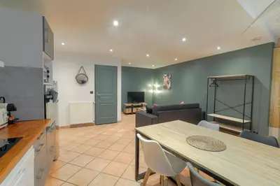Coin salon dans l'établissement Le Rempart, Appartement Proche Lyon & Villefranche