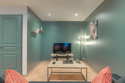 Télévision ou salle de divertissement dans l'établissement Le Rempart, Appartement Proche Lyon & Villefranche