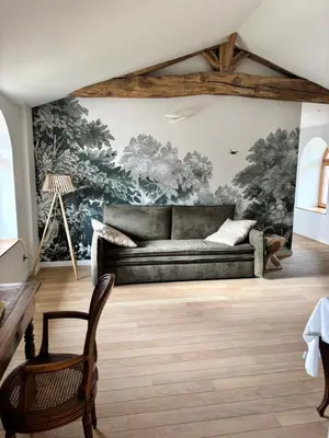 Coin salon dans l'établissement Le Domaine du Pin