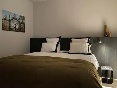 Un ou plusieurs lits dans un hébergement de l'établissement Suite design de luxe, Clim, Parking, cœur Lyon
