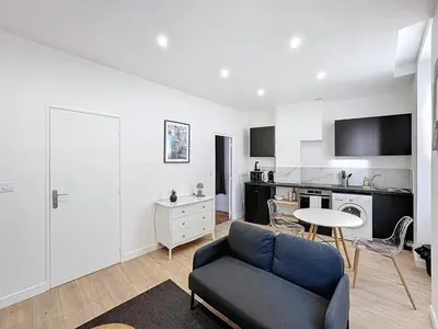 Télévision ou salle de divertissement dans l'établissement My Home Saint Jérome 2