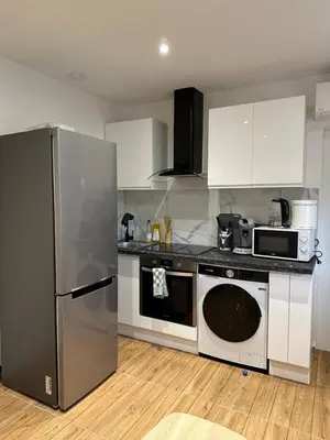 Cuisine ou kitchenette dans l'établissement Charmant T2 proche gare SNCF à 15 min de Lyon