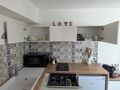 Cuisine ou kitchenette dans l'établissement Studio le Cosy - Bourgoin Centre
