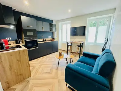 Cuisine ou kitchenette dans l'établissement l'Evasion avec Parking Privé & Clim