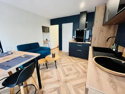 Cuisine ou kitchenette dans l'établissement l'Evasion avec Parking Privé & Clim