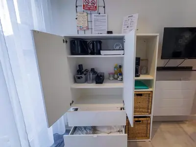 Cuisine ou kitchenette dans l'établissement Studio cosy - Petit Parilly