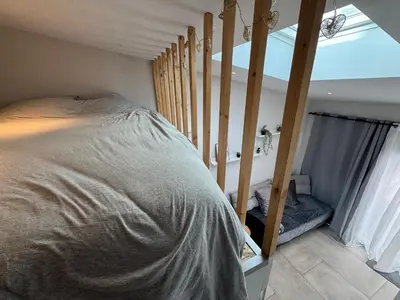 Un ou plusieurs lits dans un hébergement de l'établissement Studio cosy - Petit Parilly