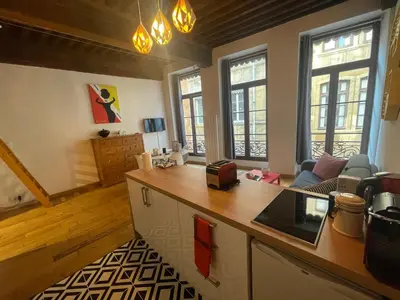 Télévision ou salle de divertissement dans l'établissement Studio Le Cocon de Jacquard