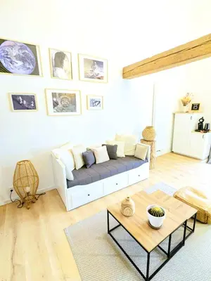 Coin salon dans l'établissement Logement tout confort au calme dans un ancien Fenil