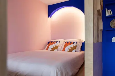 Un ou plusieurs lits dans un hébergement de l'établissement West View Studio 33 m2 vue Monts d Or et Lyon
