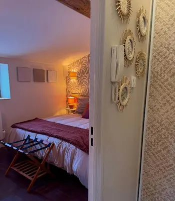 Un ou plusieurs lits dans un hébergement de l'établissement Suite Lodge