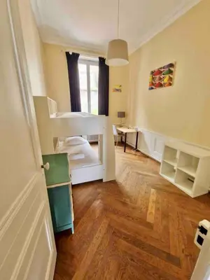Un ou plusieurs lits dans un hébergement de l'établissement Appartement de 160m2 proche centre Lyon
