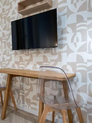 Télévision ou salle de divertissement dans l'établissement Calm and design metro Guichard