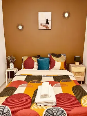 Un ou plusieurs lits dans un hébergement de l'établissement Chambre Privée chez Yérima