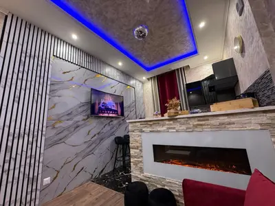Télévision ou salle de divertissement dans l'établissement Appartement de Luxe à Lyon