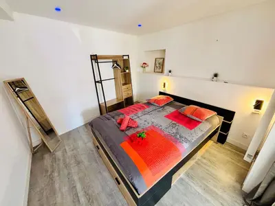 Un ou plusieurs lits dans un hébergement de l'établissement Le Maréchal Chic - Centre ville - Rive de Gier