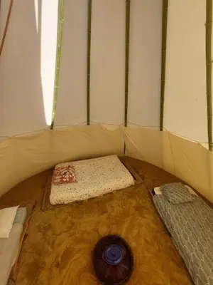 Un ou plusieurs lits dans un hébergement de l'établissement Tipi en pleine nature