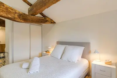 Un ou plusieurs lits dans un hébergement de l'établissement La Tour, Bel Appartement 10 mn Villefranche-sur-Saône