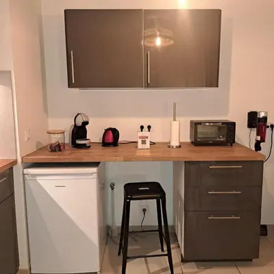 Cuisine ou kitchenette dans l'établissement L'Atelier Rochecardon