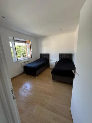 Coin salon dans l'établissement Appartement T3 rénové cœur de St Priest Parking Privé