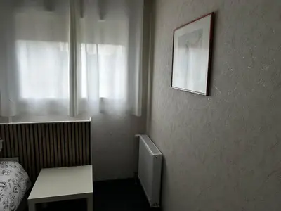 Coin salon dans l'établissement Chambre Mawa Tout Confort